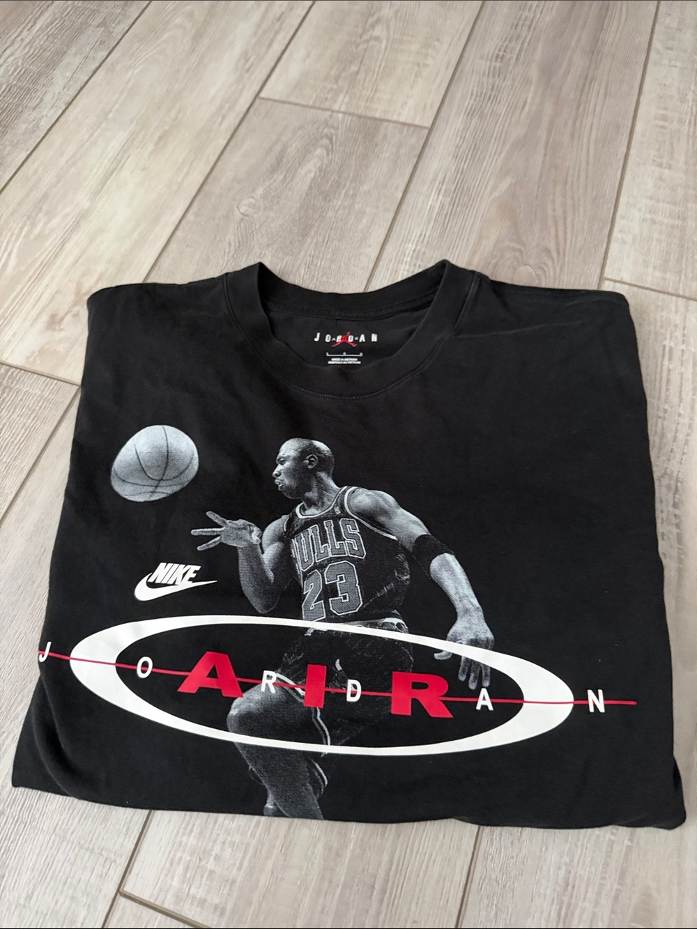 Jordan Black Graphic Basketball Logo Tee with Red Accents